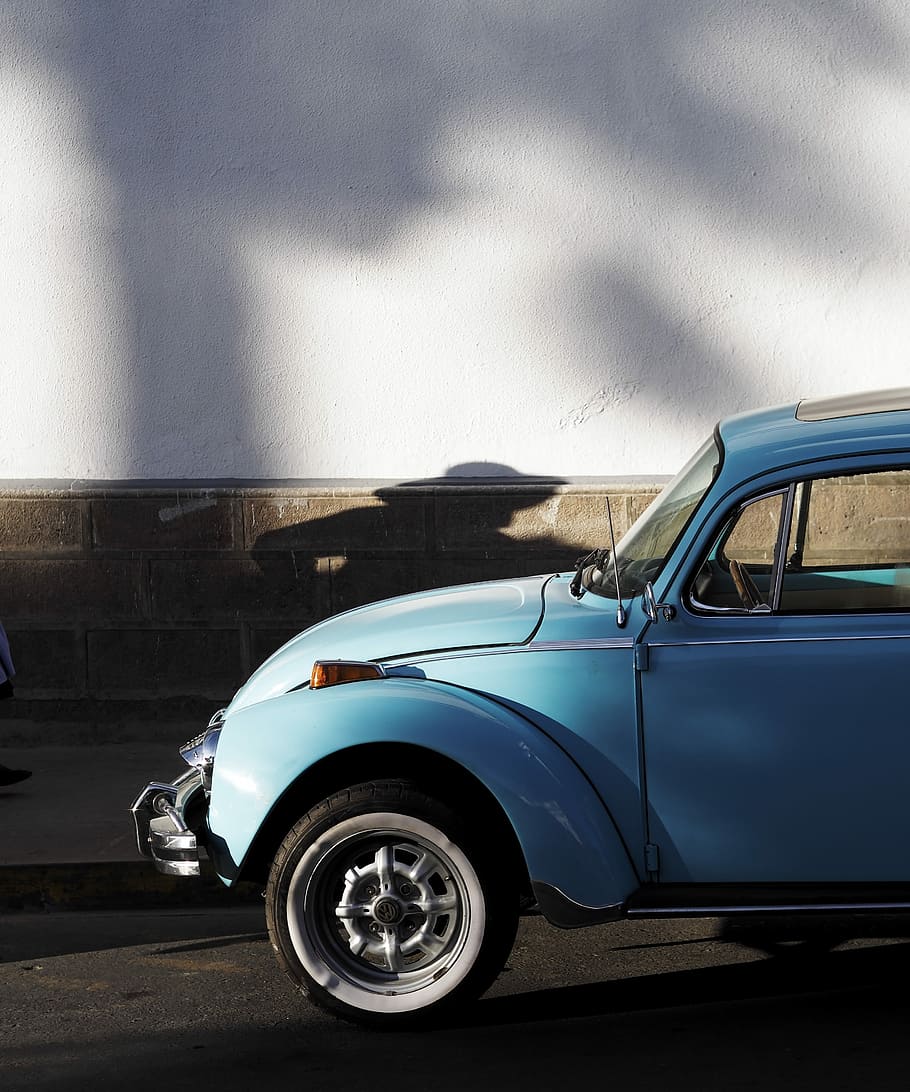 blue car on road, blue Volkswagen Beetle, street, shadow, wall HD wallpaper