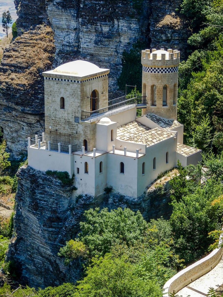 aerial photo of concrete house on stone hill at daytime, monument HD wallpaper