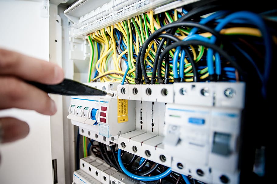 person checking white switch hub, electric, electricity, building HD wallpaper