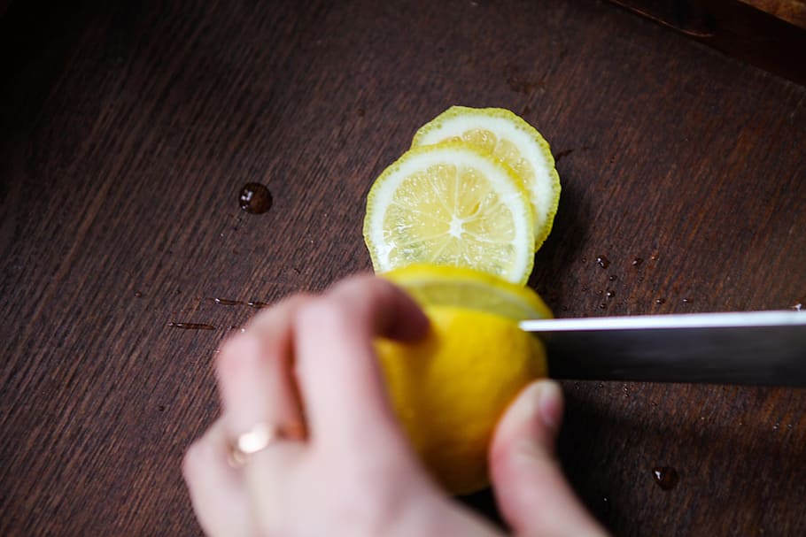 person slicing lemon, Knife, Cut, selective focus, indoors HD wallpaper
