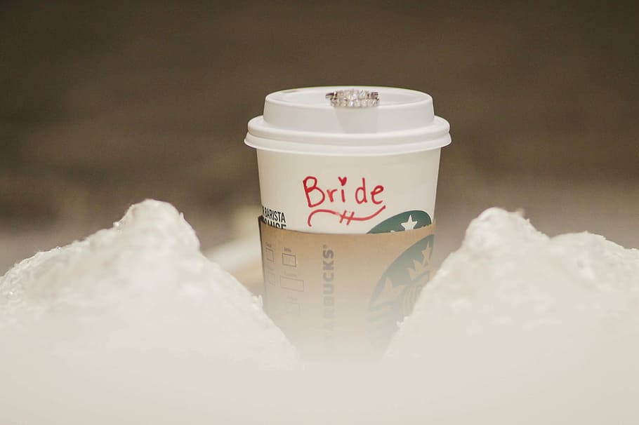 white plastic cup on ice cube, person showing Starbucks Coffee cup HD wallpaper