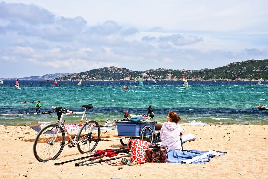 woman having a picnic on beach at daytime, windsurfing, sea, water, HD wallpaper