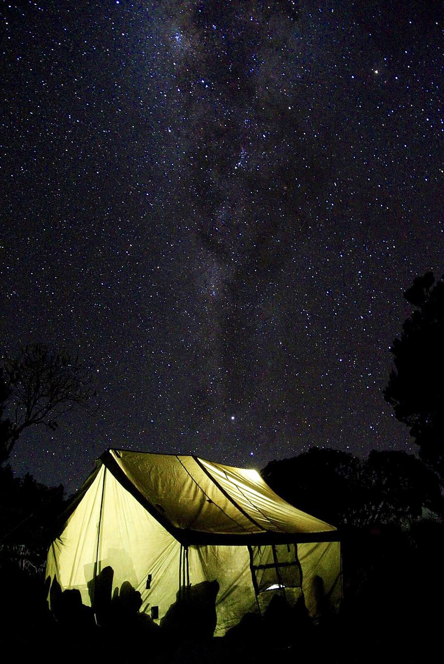 milky way galaxy under yellow camping tent, yellow and black tent under starry sky HD wallpaper