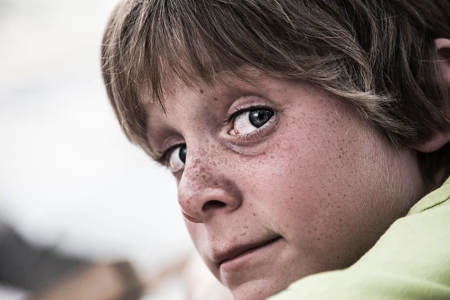 selective focus photo of boy wearing yellow top, little boy, holiday