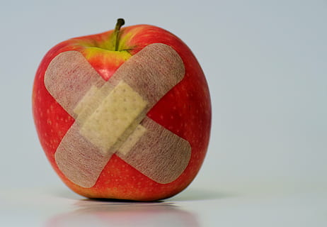 honeycrisp apple with band aid, patch, injured, association HD wallpaper