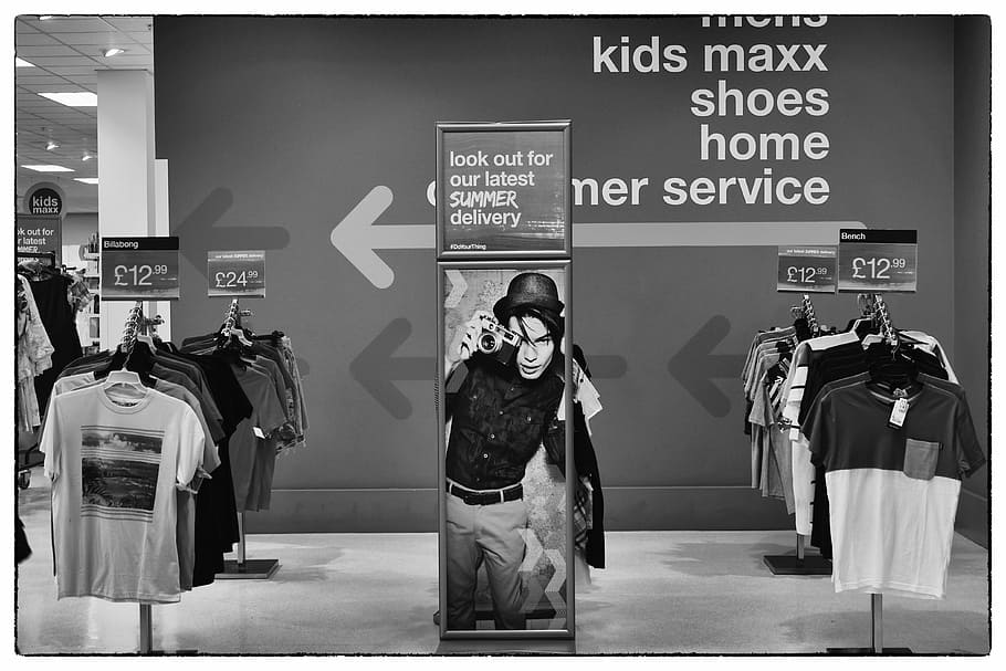 greyscale photo of hanging clothes and signage, camera, advertising HD wallpaper