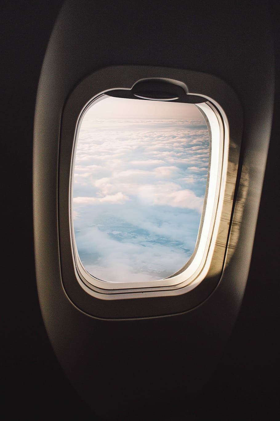 aerial photography of white clouds, view of airplane window, cloudy