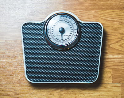 Royalty-Free photo: Bathroom scale at 50 Kilos