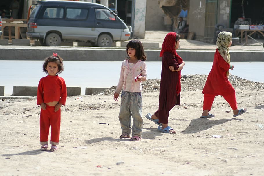 four children walking beside street, afghan, kids, poor, poverty