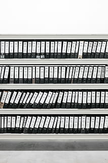 black binders on steel rack, white wooden bookcase with binders HD wallpaper