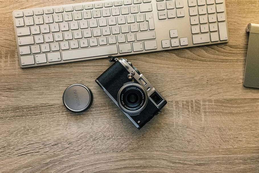black and gray DSLR camera on table, keyboard, type, letters HD wallpaper