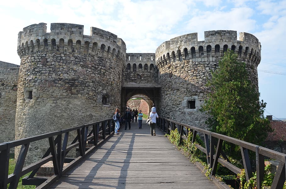 people walking on bridge in front of castle, belgrade, kalemegdan