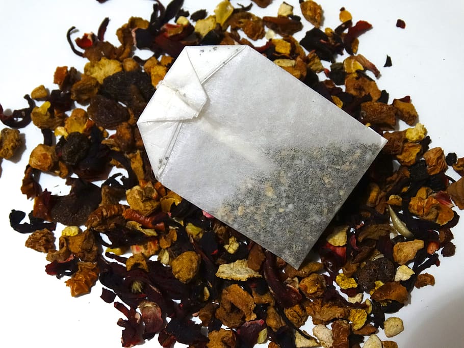 tea bag on dried leaves, tee, fruit tea, indoors, close-up HD wallpaper