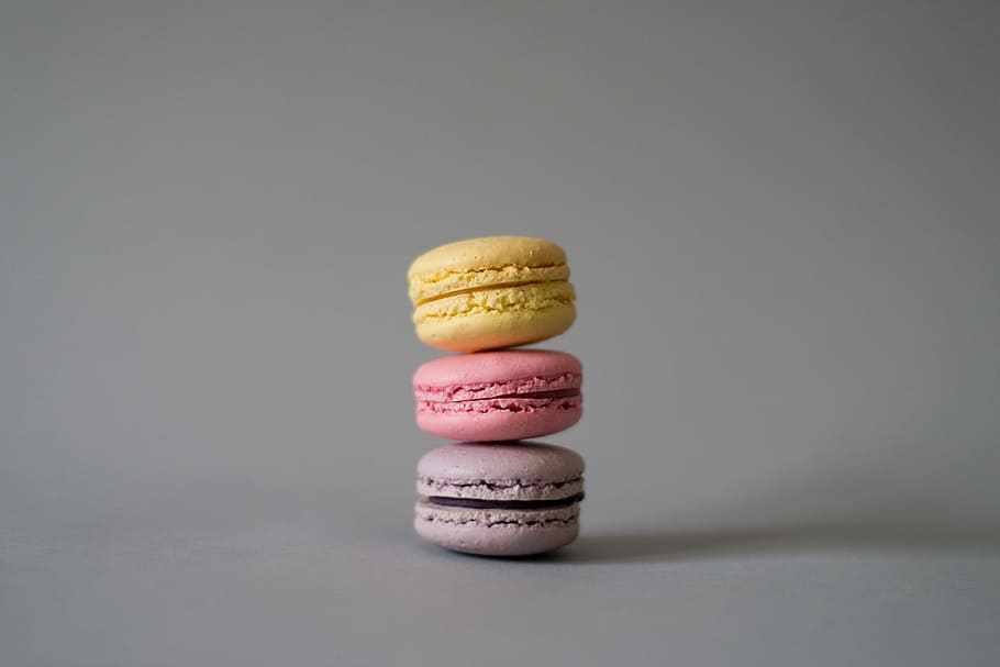 three macaroons, three muffins, stack, macaron, pastel, shadow HD wallpaper