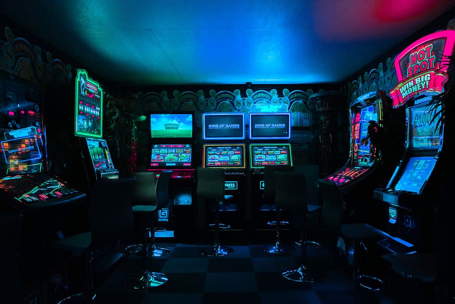 HD wallpaper: gaming room with arcade machines, video arcade shop interior - Wallpaper Flare