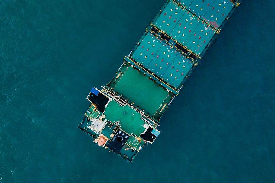 aerial photography of cargo boat, aerial view photography of body of water HD wallpaper