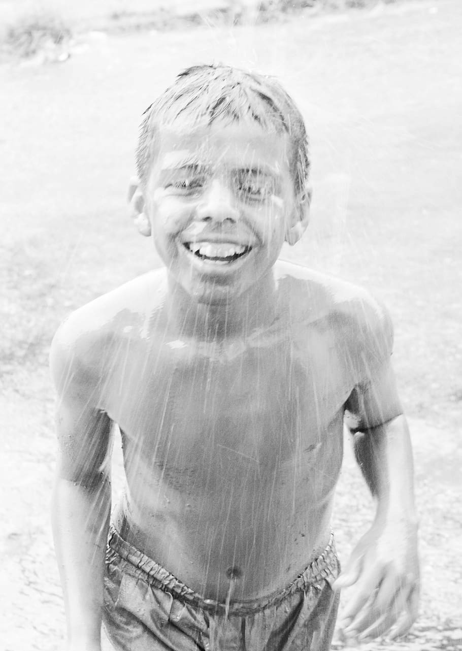 child, playing, rain, smiling, happiness, one person, emotion HD wallpaper