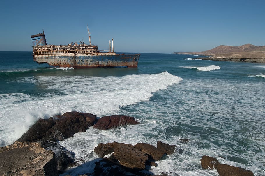 Decaying Ship In The Ocean, bay, daylight, island, outdoors, rocks HD wallpaper