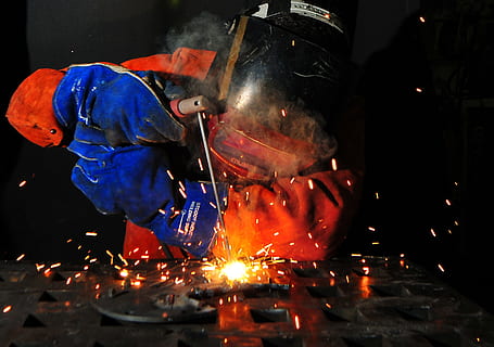 man wearing welding helmet holding welding torch, Fire, night HD wallpaper