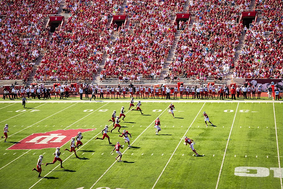 An American Football game in action, various, crowd, people, pitch