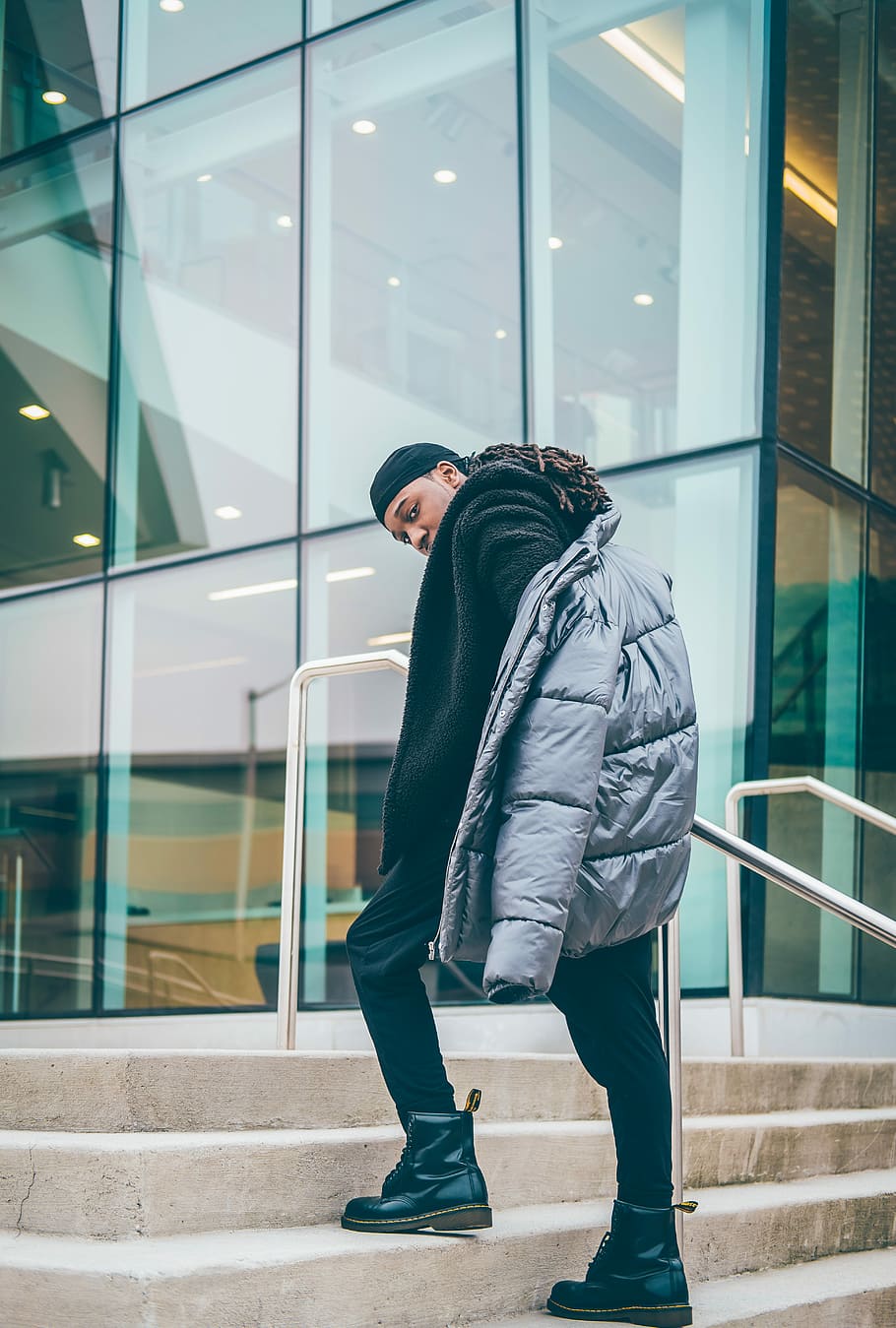 man walking on stairs during daytime, man walking on stair, building HD wallpaper