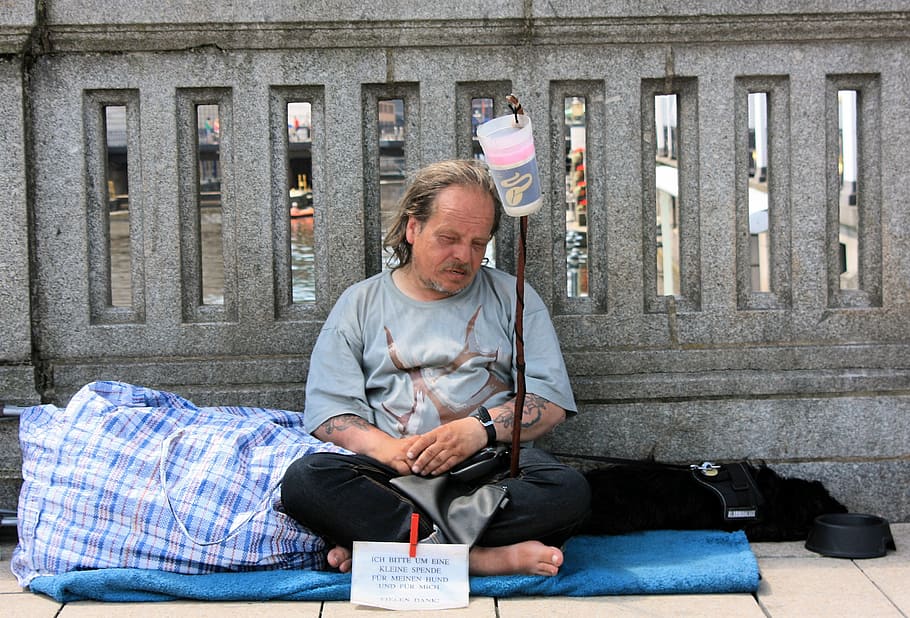 man sitting near concrete wall, poverty, hamburg, germany, homelessness, HD wallpaper