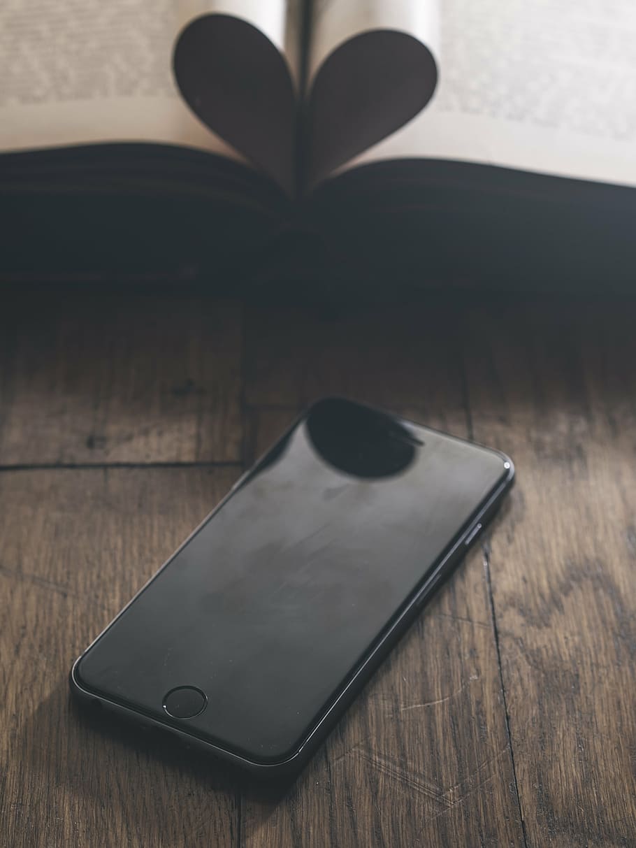 space gray iPhone 6 turned off on brown wooden table, love, heart