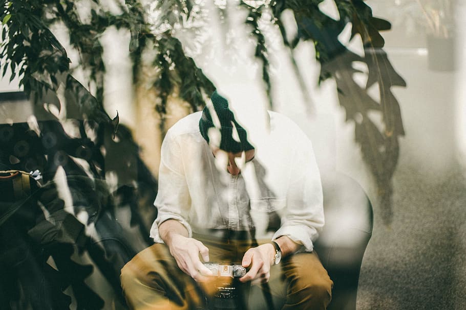 man sitting on chair, people, camera, lens, photography, photographer HD wallpaper