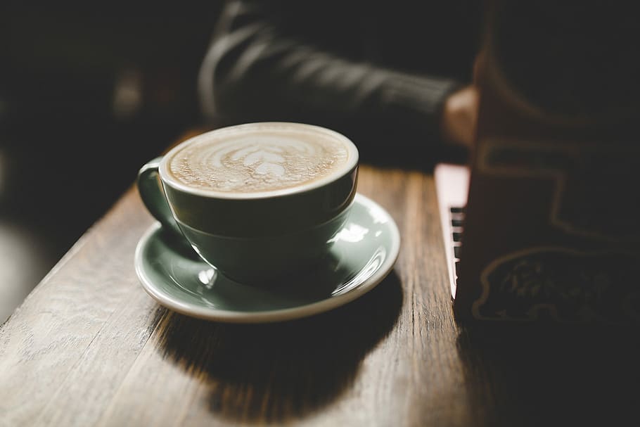 cafe latte served on green ceramic cup, laptop, person, coffee HD wallpaper