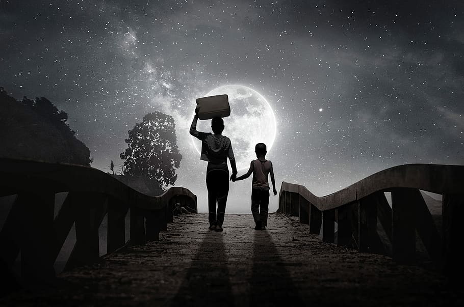 person holding the hand of the child while carrying box digital wallpaper HD wallpaper