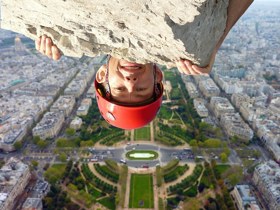 man wearing red safety hat, rock upside down, abyss, risk, courageous HD wallpaper