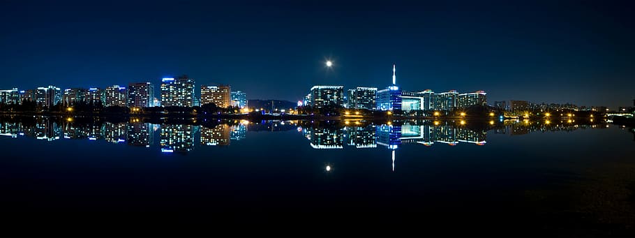 body of water near building at nighttime, night view, city, panorama