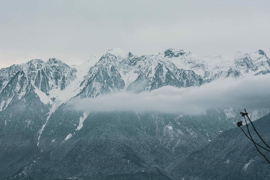 photo of mountains covered by snow, in distant photo of mountain cape by snow HD wallpaper
