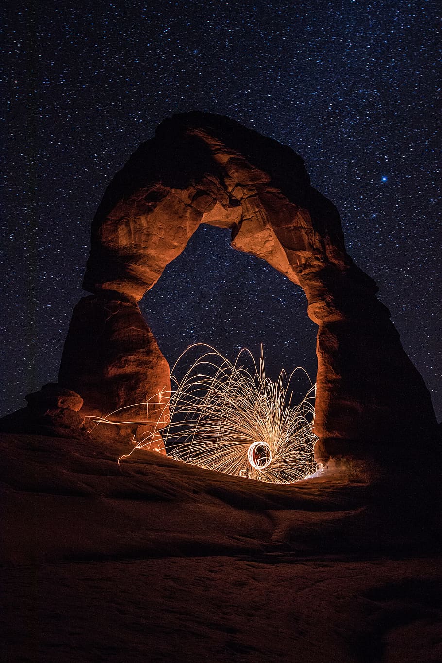 time lapse photograph of sky and stone formation, arch, dark HD wallpaper