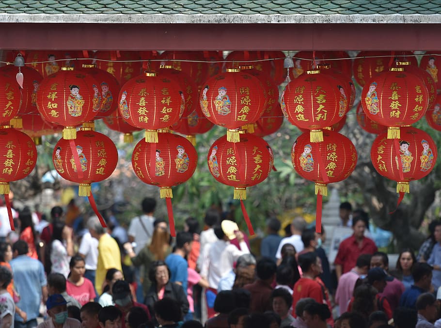 hanging round red lanterns near crowd at daytime, group of people walk on road HD wallpaper
