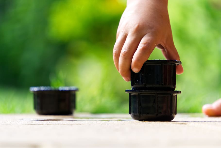 stack, play, cup, make, tower, build, child, child's hand, small child HD wallpaper