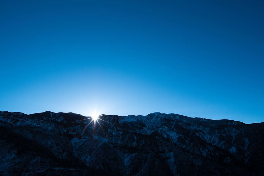 sunrise over the mountain, gray mountain under blue sky, rock mountain HD wallpaper