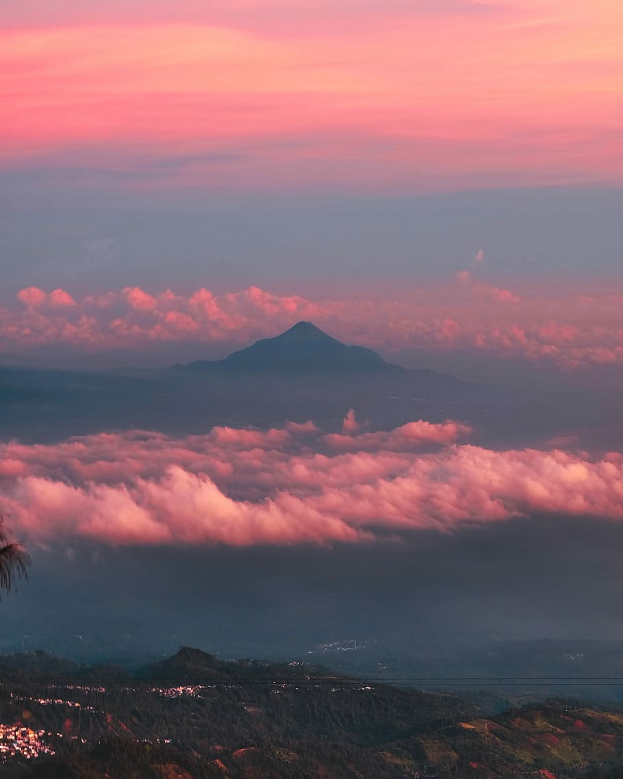 sea of clouds during golden hour, photo of mountain surrounded with clouds HD wallpaper