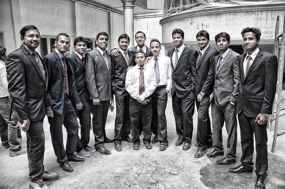 men wearing formal suits standing side by side, corporate, college students