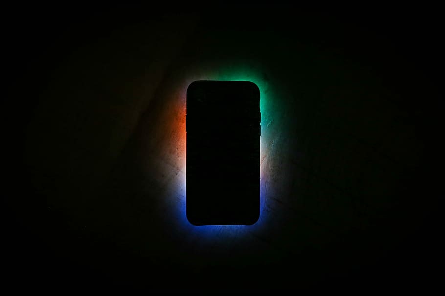 HD wallpaper: closeup photo of Android smartphone, turn-on smartphone in  the dark | Wallpaper Flare