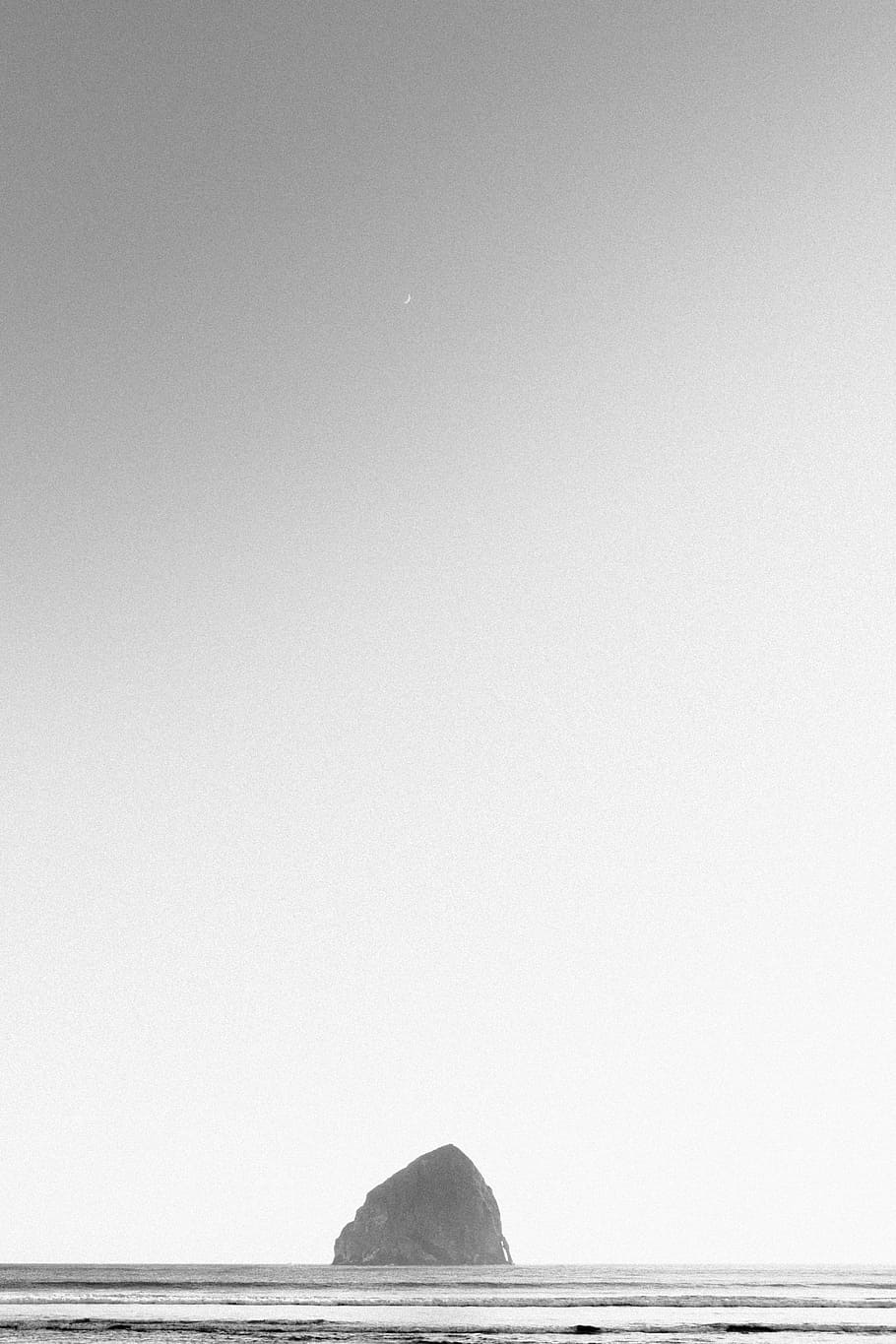 grayscale photo of stone on body of water at daytime, rocks HD wallpaper