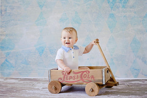 toddler sitting on brown Pepsi-Cola pull wagon, Cute, Toy, Wheel HD wallpaper