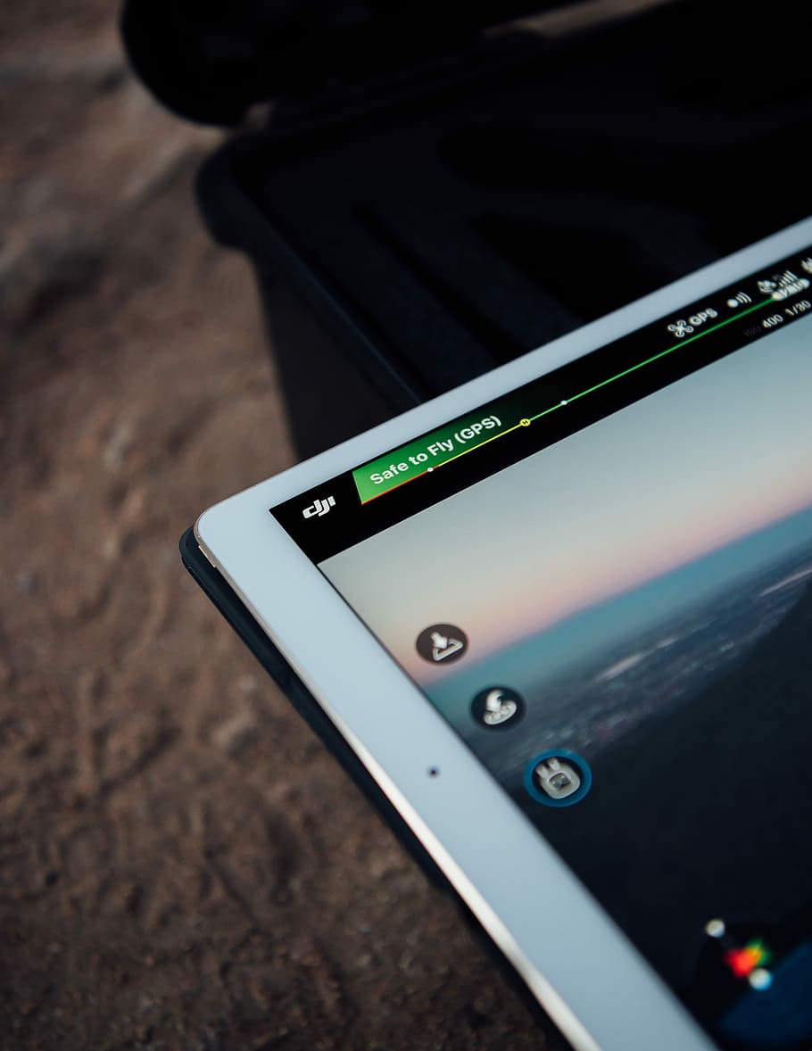 turned on gray monitor, turned-on white tablet computer, dji HD wallpaper