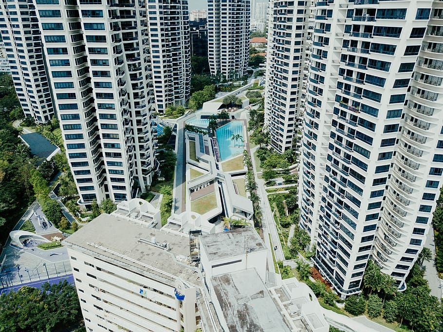 aerial photography of white concrete buildings, aerial photography of tall buildings at daytime HD wallpaper