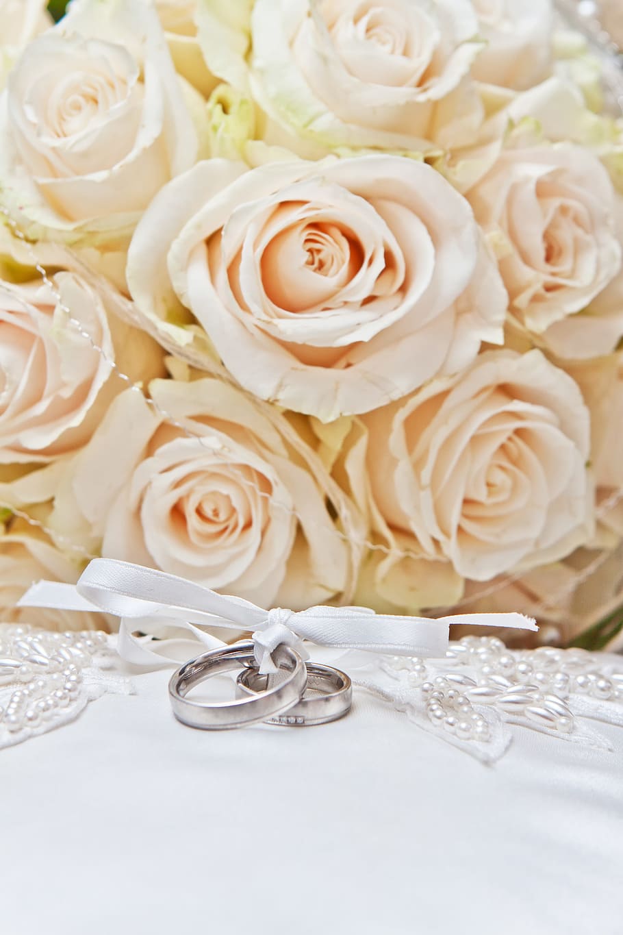 white flower bouquet and two silver-colored rings, wedding, marry