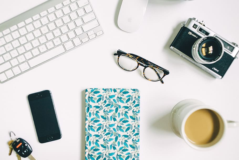 black frame eyeglasses beside black and gray SLR camera, clear eyeglasses with frames beside black compact camera, HD wallpaper