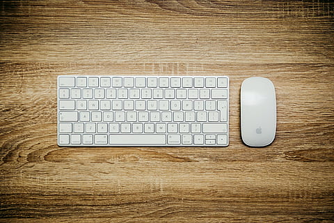 The pair, Apple Wireless Keyboard and Magic Mouse on wooden panel HD wallpaper