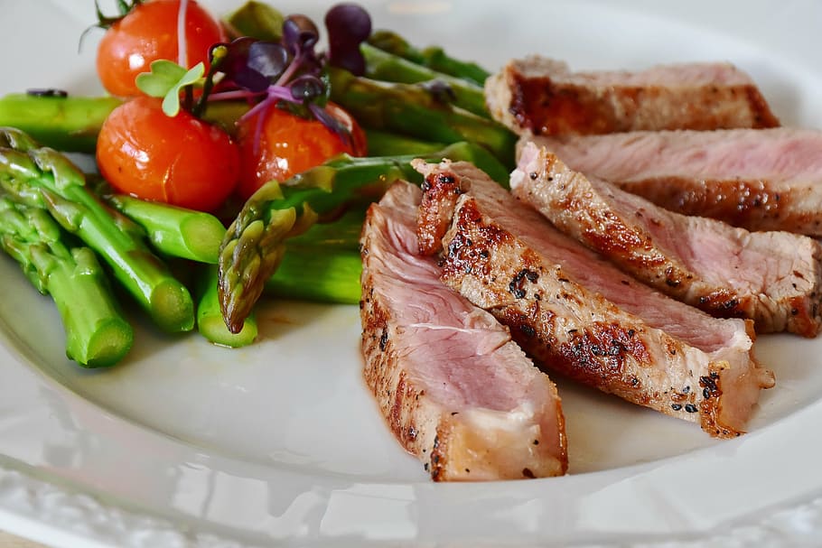photo of steak served on plate, asparagus, veal steak, meat, pink
