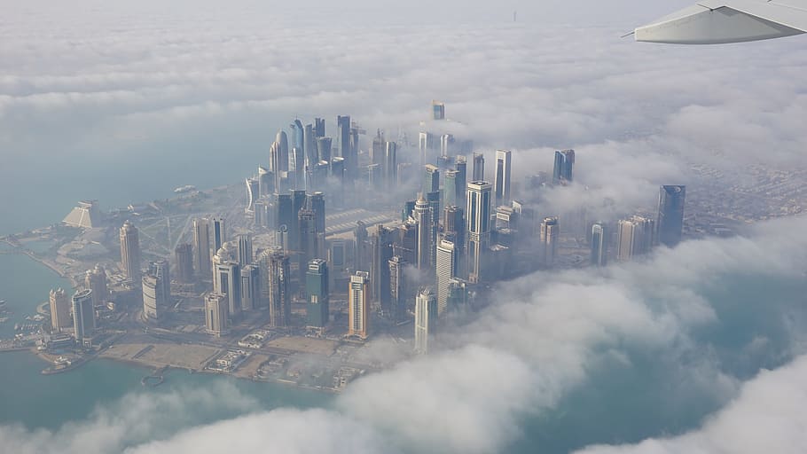 aerial view if a city during daylight, skyscraper, clouds, doha HD wallpaper