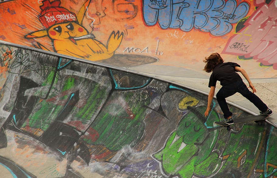 HD wallpaper person holding blue skateboard walking near graffiti man  holding skateboard  Wallpaper Flare